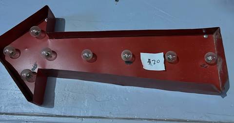Red metal arrow marquee light