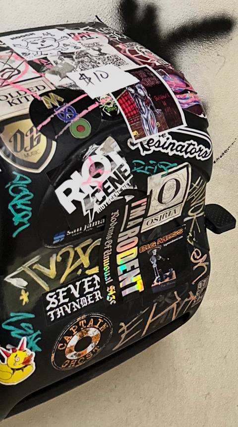 Sticker-bombed paper towel dispenser